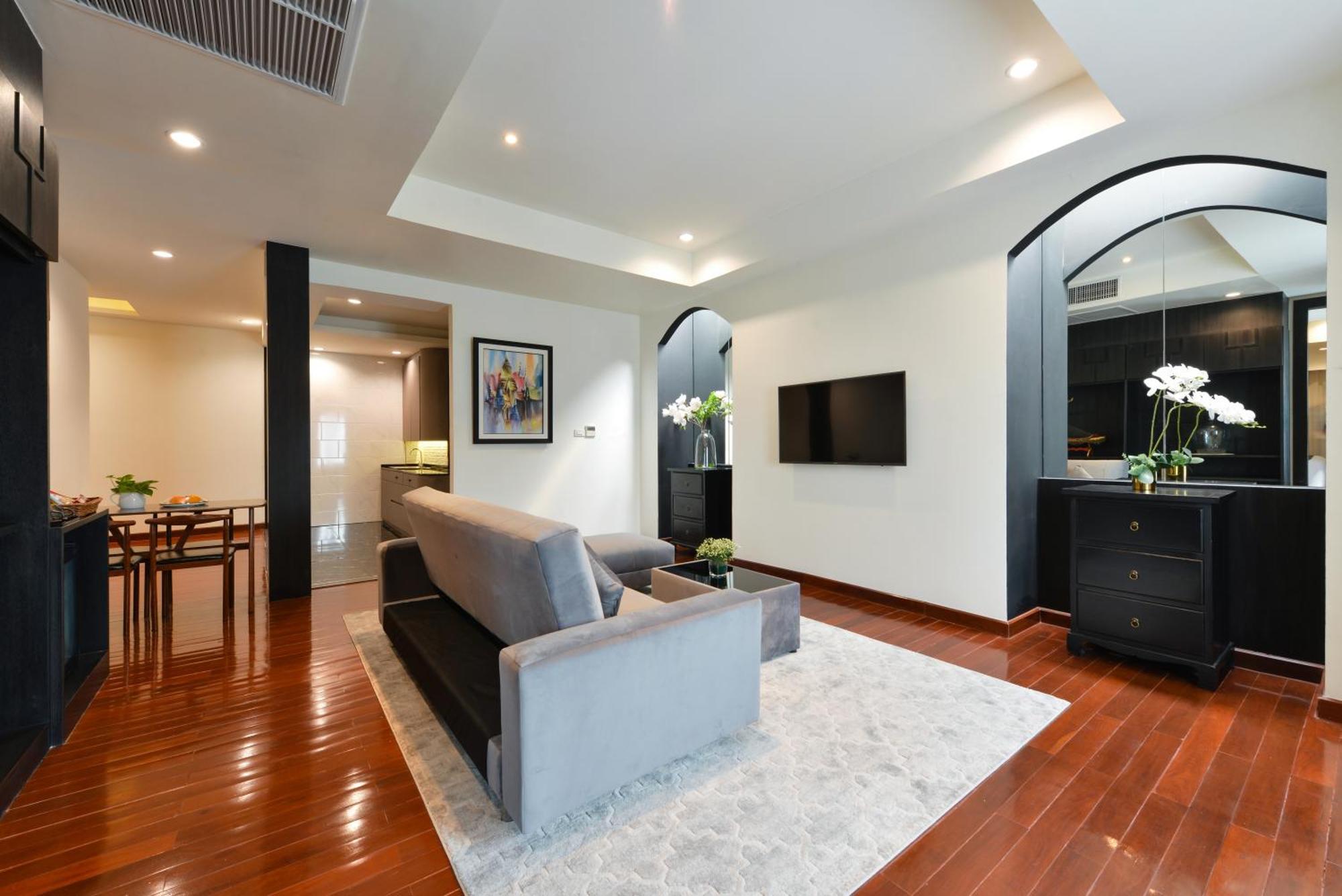ヴィラ デ プラナコーン ルレ&シャトー バンコク都 エクステリア 写真 A living room in a condominium