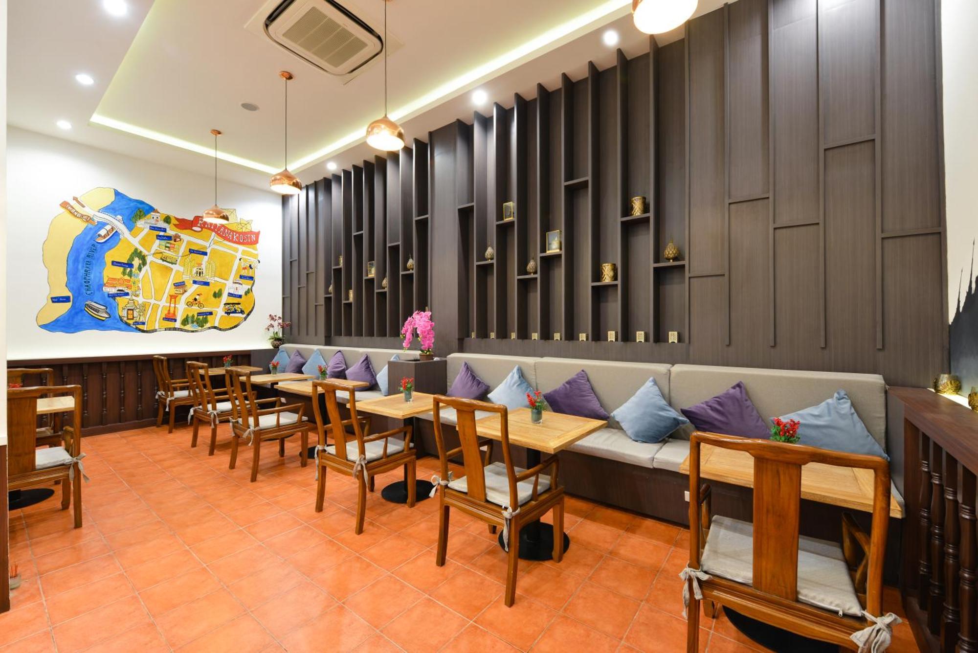 ヴィラ デ プラナコーン ルレ&シャトー バンコク都 エクステリア 写真 The interior of the restaurant